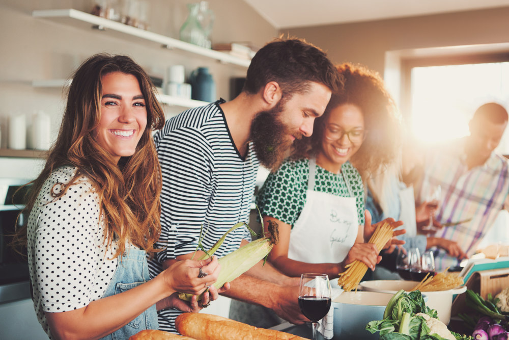 Multiracial Friends Cook Tasteful Food.